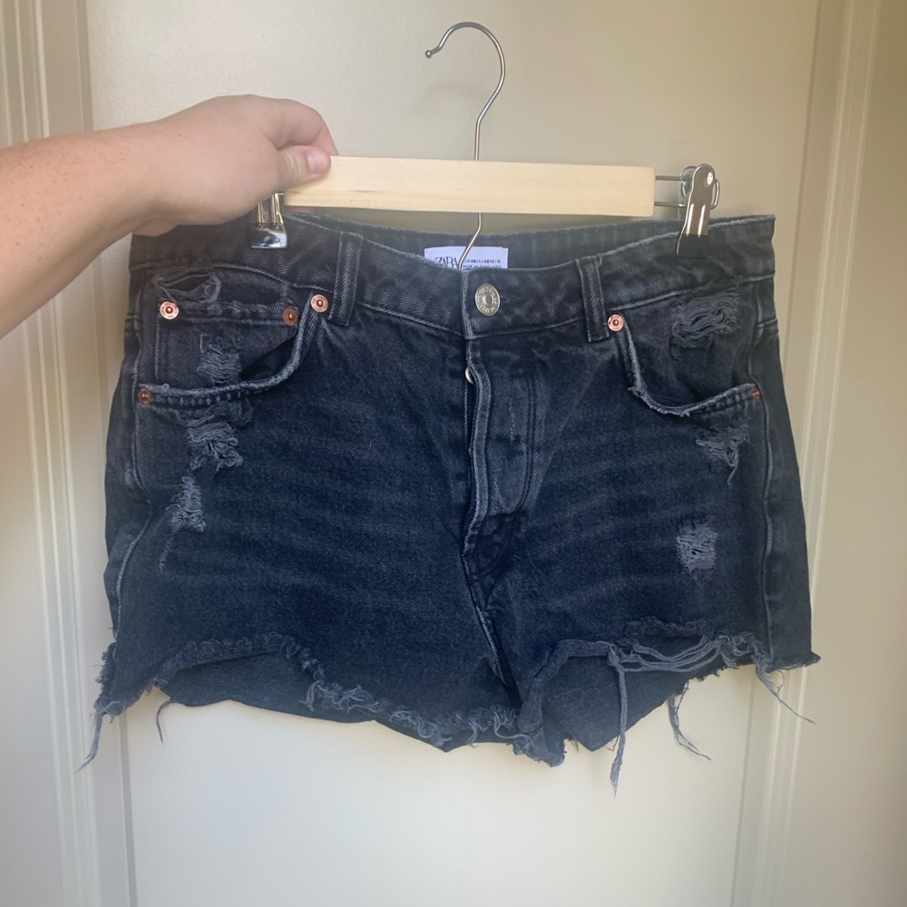 black ripped jeans